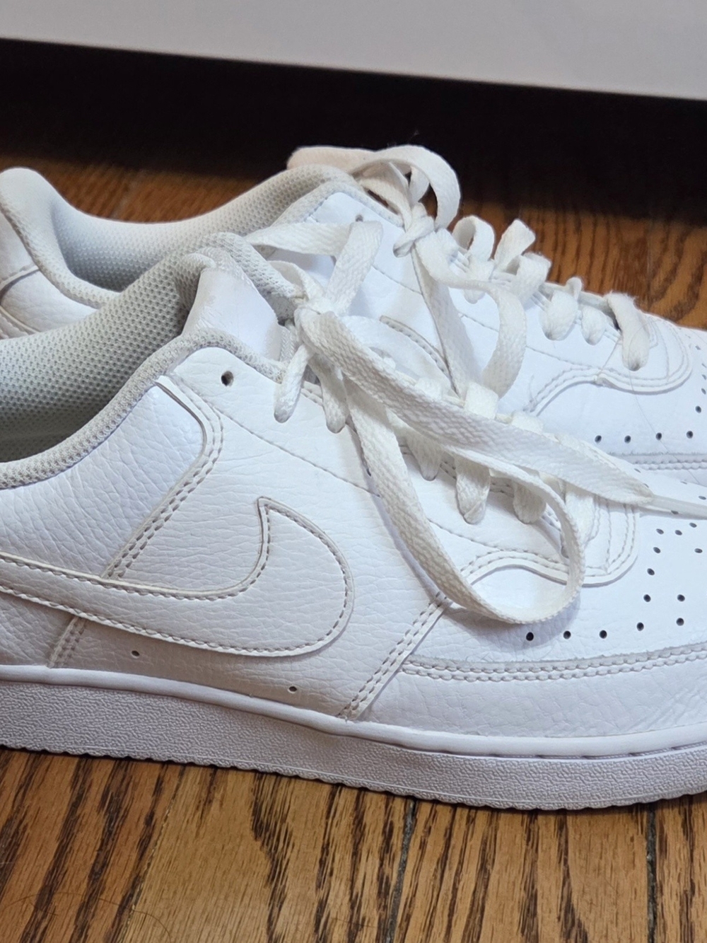 Nike Women’s Classic All-White Leather Court Vision Sneakers